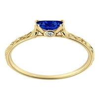 1. Laboratorij Amish stvorio je prsten od plavog safira i dijamanata od žutog zlata od 14 karata s filigranskim